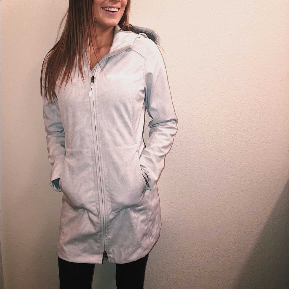 White patterned long rain jacket